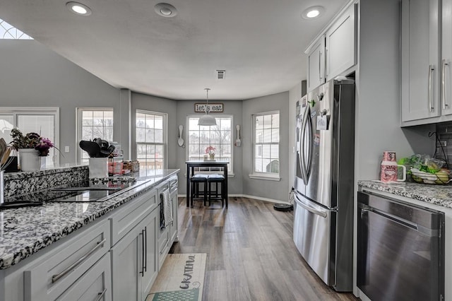 21 Meadow Brook Ln, Anderson, MO 64831 - kitchen with pendant lighting, stainless steel refrigerator, white cabinetry, beverage cooler, and light stone counters