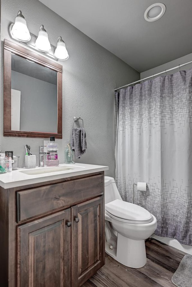 21 Meadow Brook Ln, Anderson, MO 64831 - bathroom with wood-type flooring, toilet, and vanity