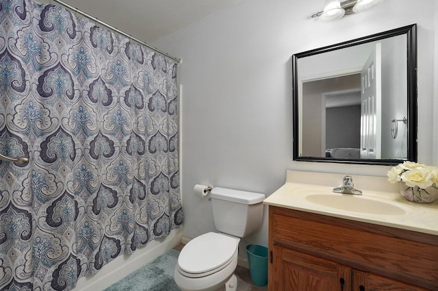 full bathroom featuring vanity, shower / bath combination with curtain, and toilet