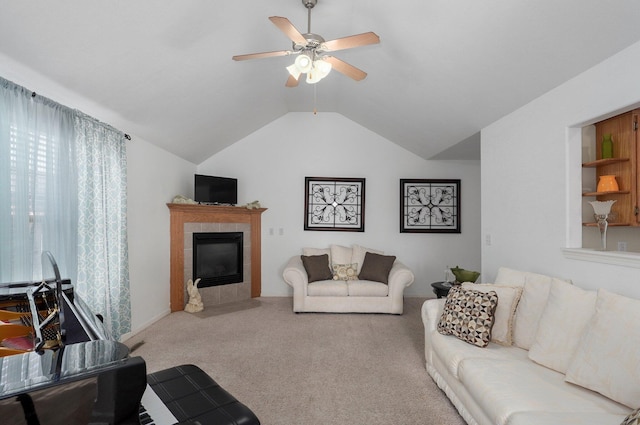 living room with light carpet, a tile fireplace, ceiling fan, and lofted ceiling