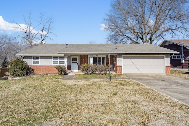 ranch-style home with a garage and a front lawn