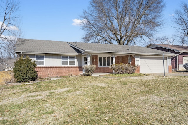 ranch-style house featuring a garage and a front yard