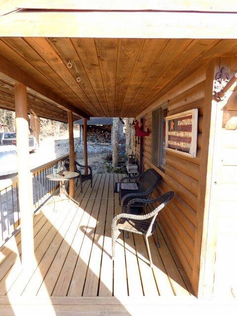 wooden terrace with covered porch