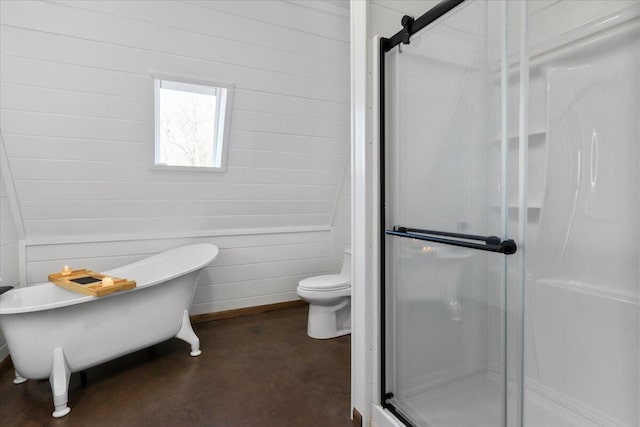 bathroom featuring toilet, separate shower and tub, and concrete floors