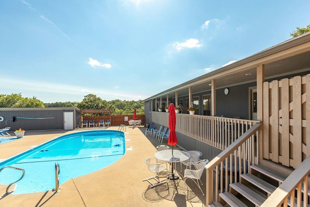 view of pool with a patio