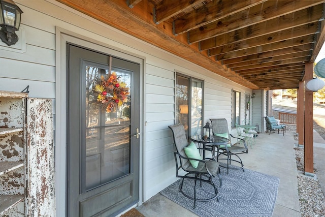 view of patio featuring covered porch