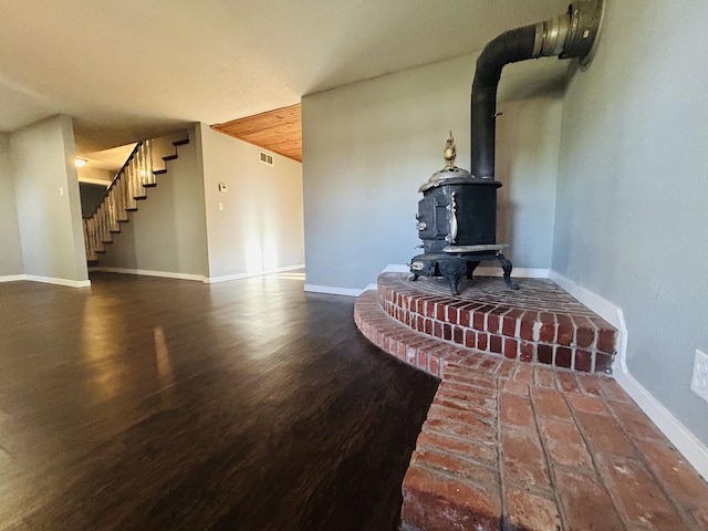 living room featuring a wood stove