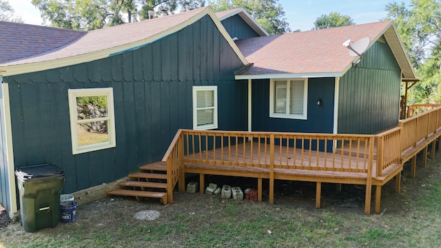 rear view of property with a deck