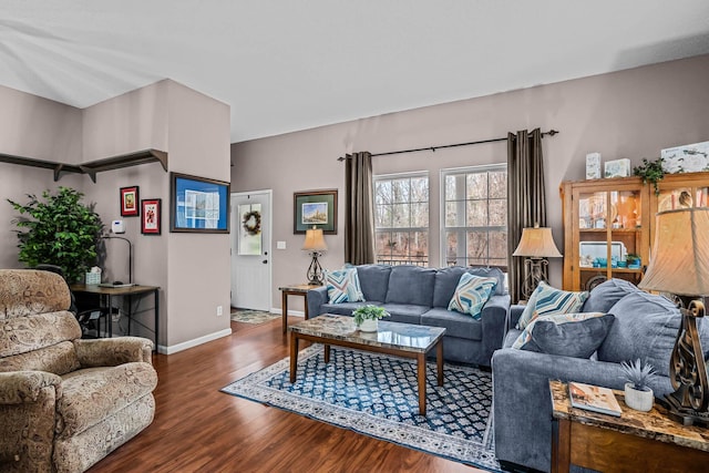 living room with dark hardwood / wood-style flooring