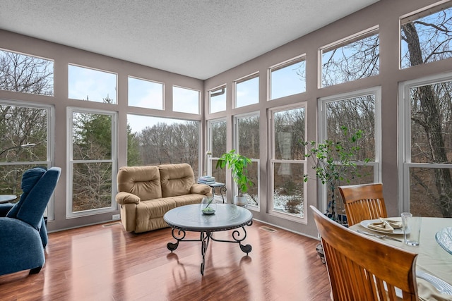 sunroom / solarium with a wealth of natural light