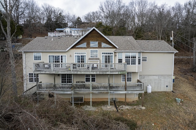 rear view of house with a deck