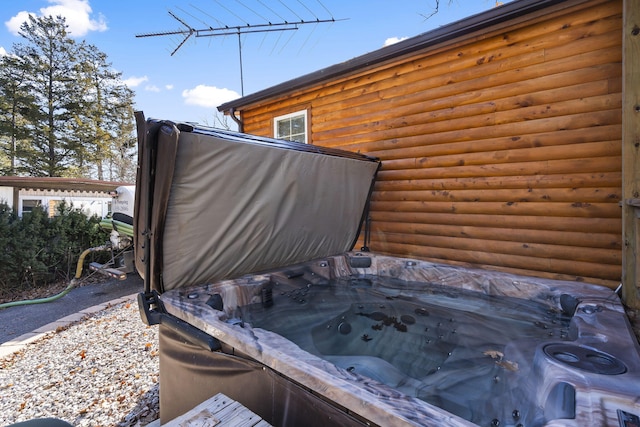 view of patio with a hot tub