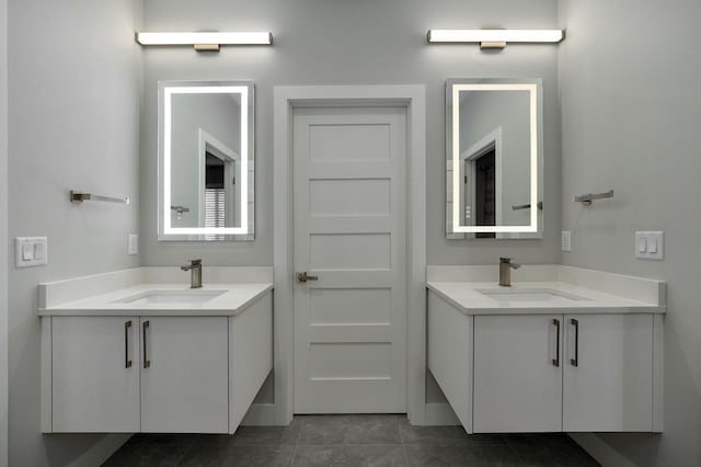 bathroom featuring tile patterned floors and vanity