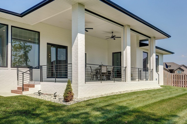 exterior space featuring ceiling fan