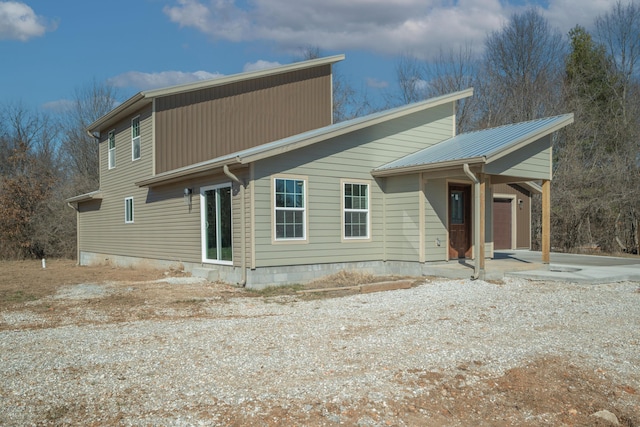 exterior space with a garage