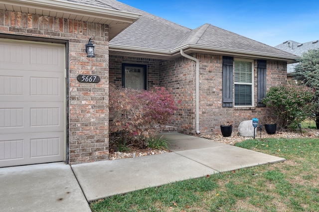 property entrance with a garage