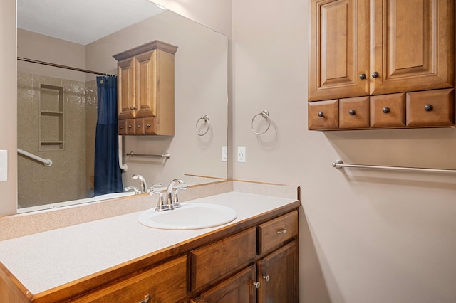 bathroom with a shower with curtain and vanity