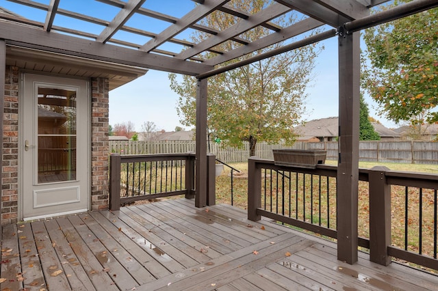 wooden terrace with a pergola