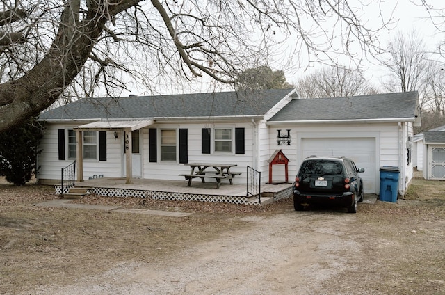 single story home with a garage