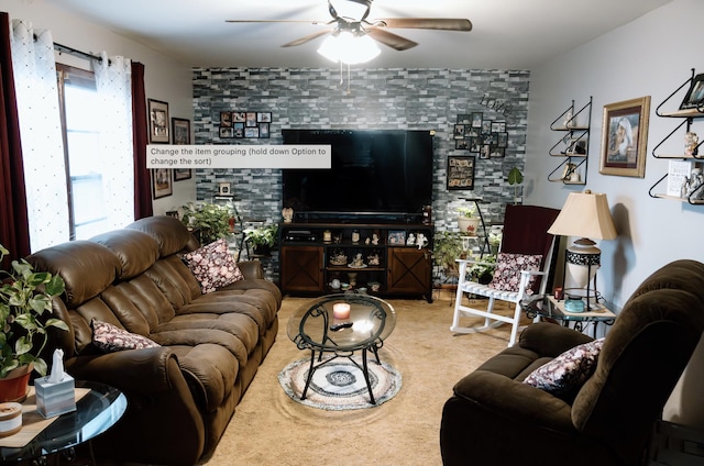 carpeted living room with a wealth of natural light and ceiling fan