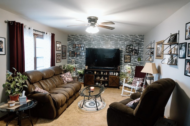 living room with ceiling fan and carpet flooring