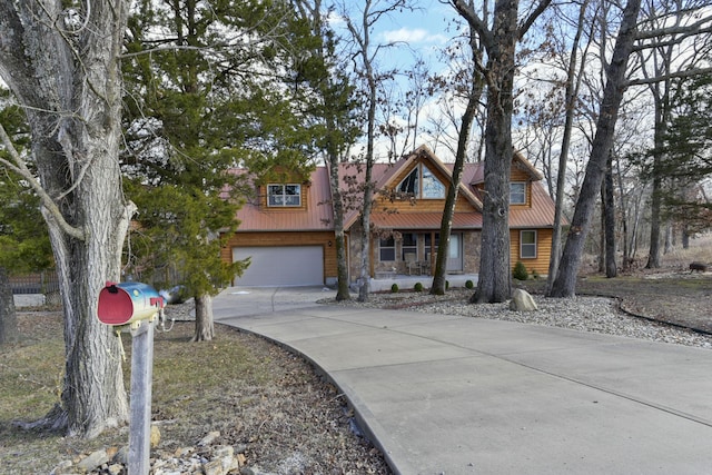 view of front of property with a garage