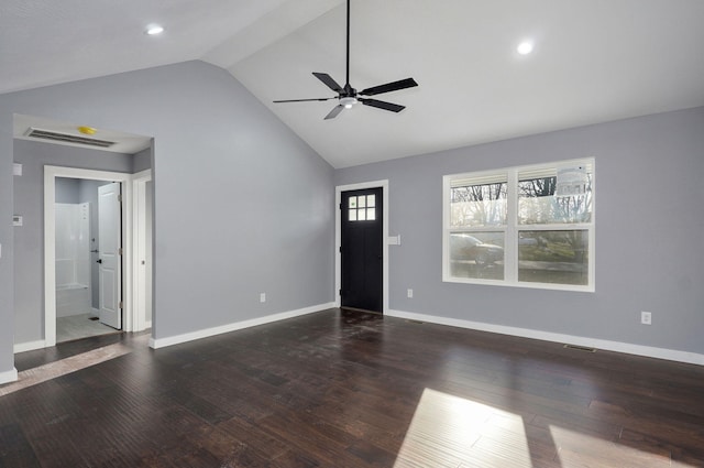 unfurnished living room with vaulted ceiling, visible vents, baseboards, and wood finished floors