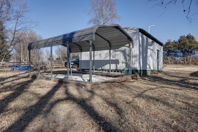 view of outdoor structure with a carport