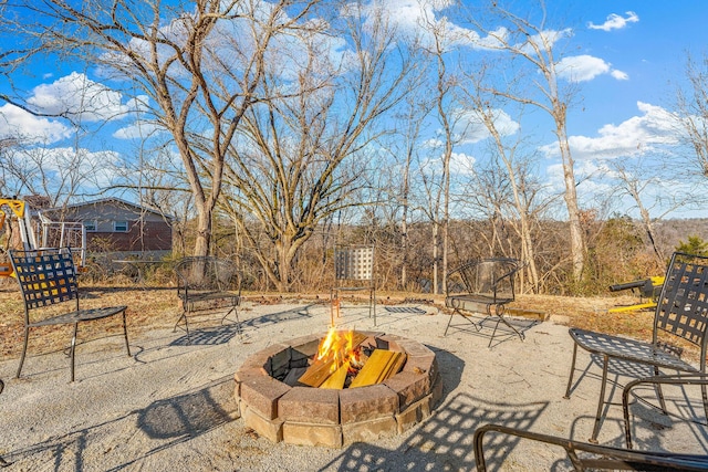 view of patio with a fire pit