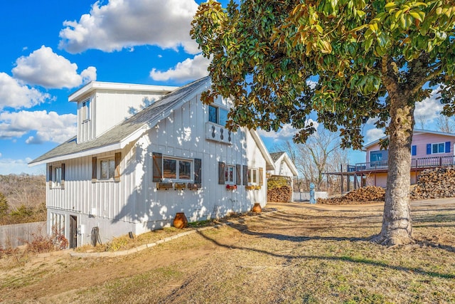 view of home's exterior with a yard