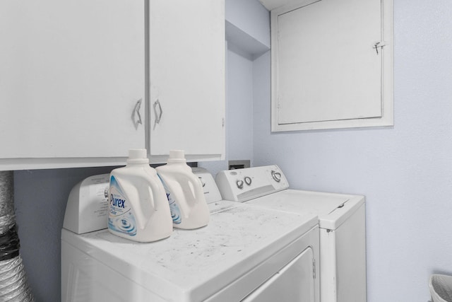 laundry area featuring washing machine and clothes dryer