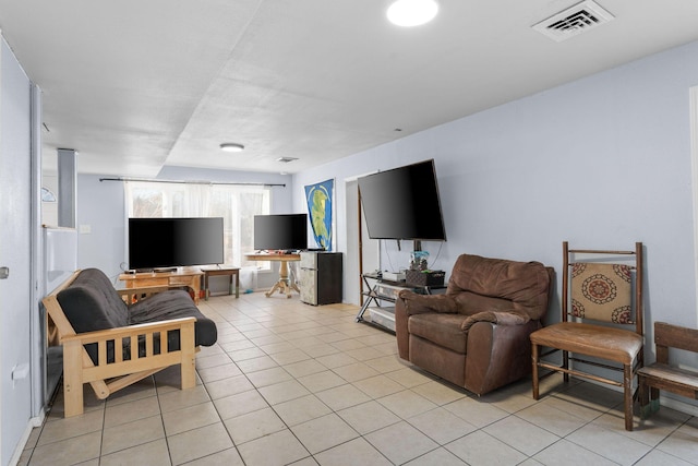 living room featuring light tile patterned floors