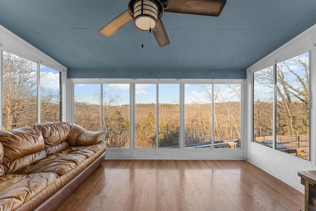 sunroom featuring plenty of natural light and ceiling fan