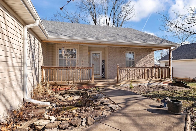 doorway to property featuring a porch