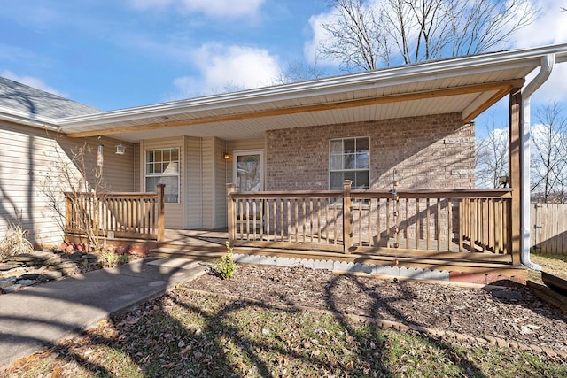 entrance to property featuring covered porch