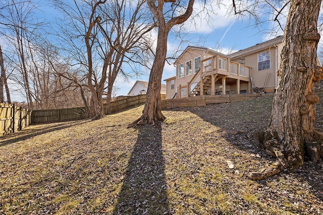 view of yard with a wooden deck