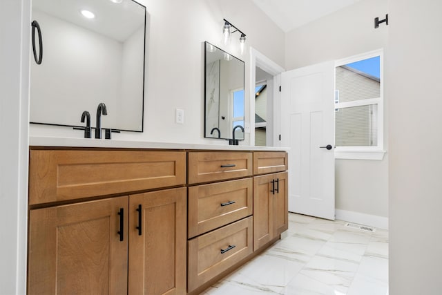 bathroom featuring vanity