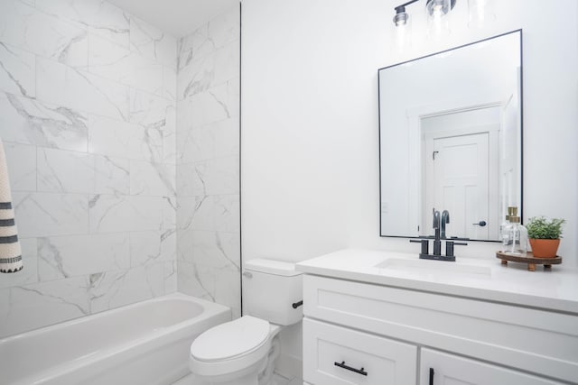 full bathroom with toilet, vanity, and shower / washtub combination