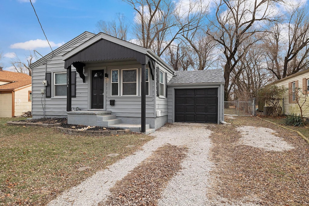 bungalow-style house featuring a garage