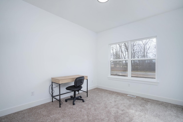 office space with light colored carpet