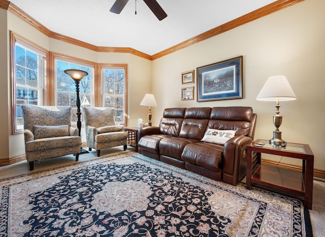 carpeted living room featuring ornamental molding, a healthy amount of sunlight, and ceiling fan