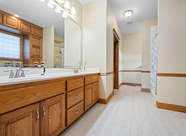 bathroom with vanity and a shower with curtain