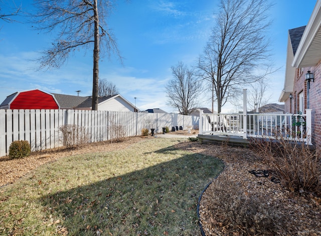 view of yard with a wooden deck