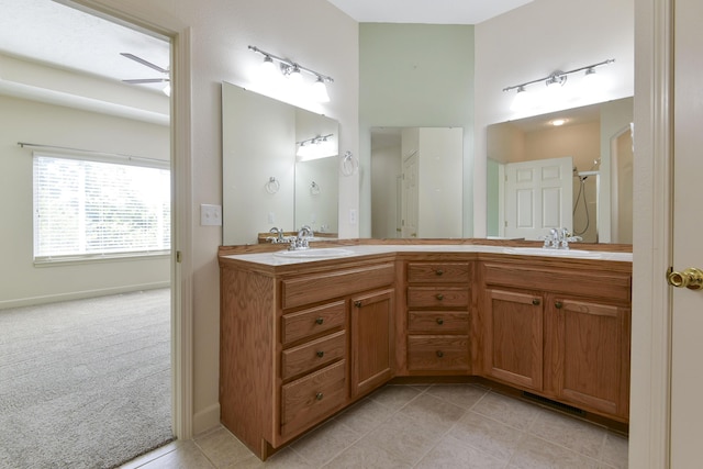 bathroom with vanity, tile patterned floors, and ceiling fan