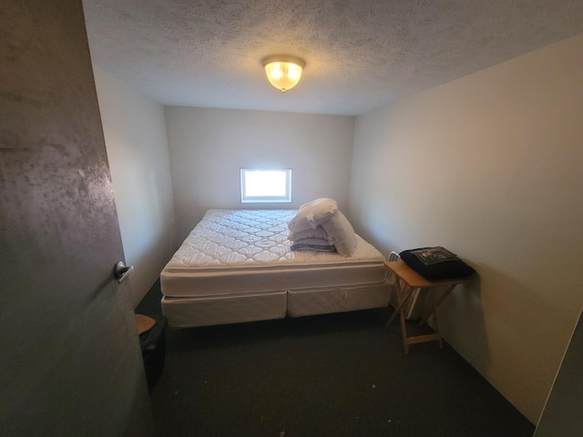 bedroom with a textured ceiling