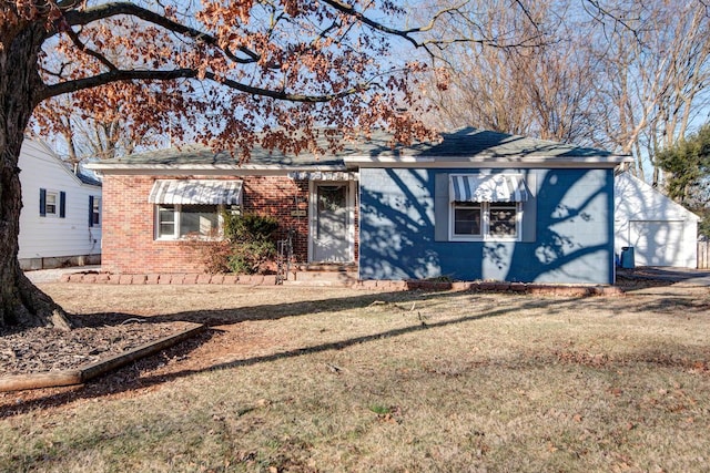 ranch-style home with a front yard