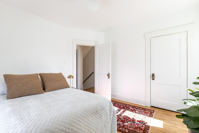 bedroom featuring hardwood / wood-style floors