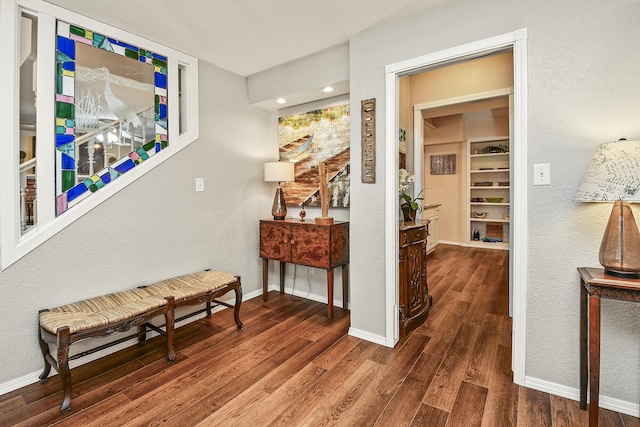 hallway featuring dark hardwood / wood-style floors