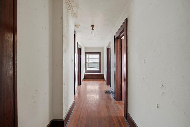 hall featuring dark hardwood / wood-style floors