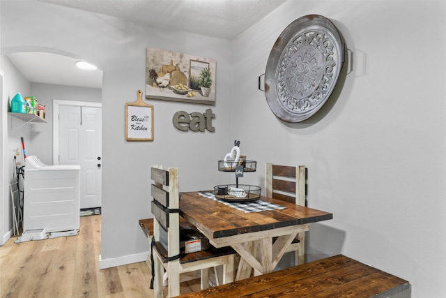 dining area with light hardwood / wood-style flooring